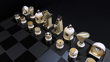 Подарочные шахматы из кости и золота мокуме гане.