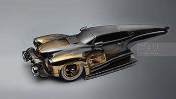 Масштабная модель автомобиля из золота и серебра.